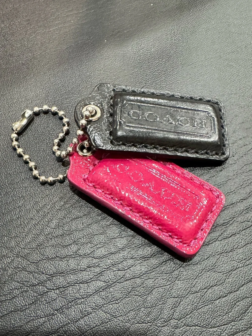 COACH Double Leather Hangtag Set of 2 in Black and Hot Pink - Silver Metallic